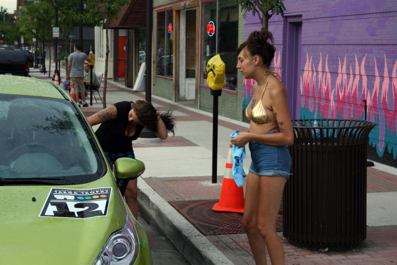 Illustration for article titled Noir Leather Bikini Car Wash Meetup Pictures